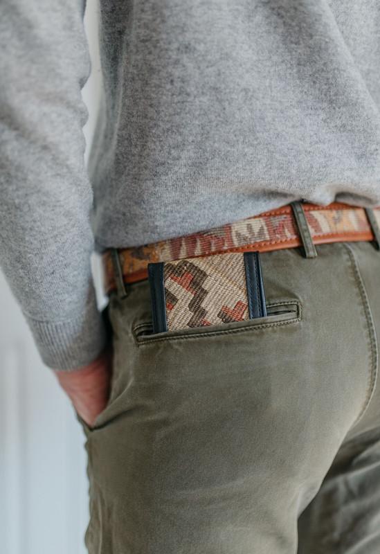 Handwoven vintage Sumak Kilim carpet with soft leather trim.