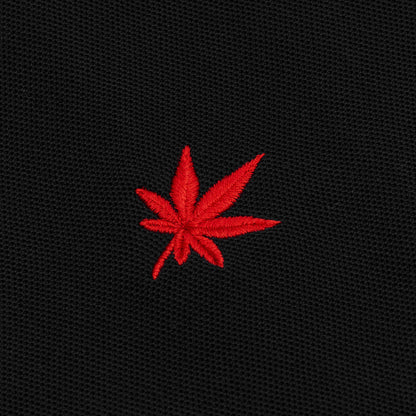 Red embroidered leaf.