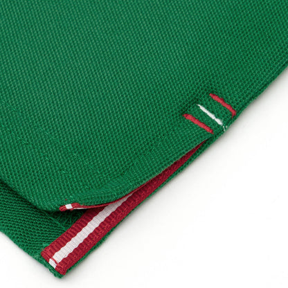 Red and white grosgrain detail on side vent.