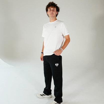 Adult model wearing Black Baseline Straight Leg sweatpants