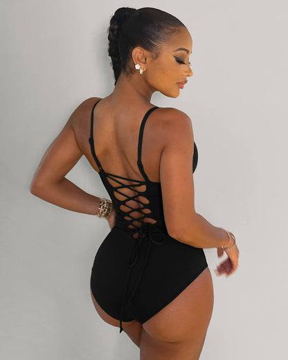 Model wears Lacey One Piece Open Back Sculpting Tummy Control Shapewear Swimsuit - Black back view
