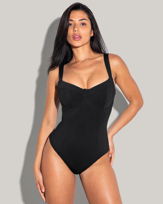 Model posing in Lifty - Black One Piece Tummy Control Shapewear Swimsuit full front view